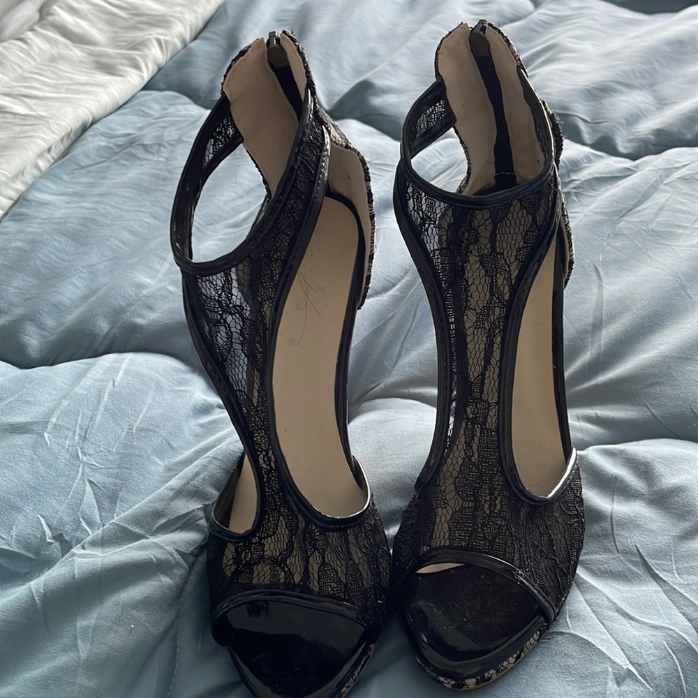 Black lace and white heels never worn